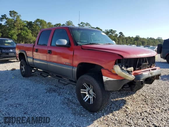 2002 Chevrolet Silverado 1500HD LT with VIN 1GCGK13UX2F163509, listed as a Copart auction lot 73054424 with 438,736 mi miles and Salvage title. Bid and sale history available at DreamBid. Image 4.