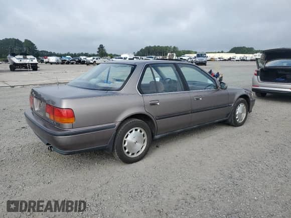 1993 Honda Accord with VIN 1HGCB7579PA060547, listed as a Copart auction lot 60890505 with 276,606 mi miles and Clean title. Bid and sale history available at DreamBid. Image 3.