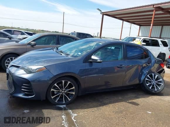 2019 Toyota Corolla LE with VIN 5YFBURHE5KP912617, listed as a IAAI auction lot 43125908 with 142,721 mi miles and . Bid and sale history available at DreamBid. Image 14.