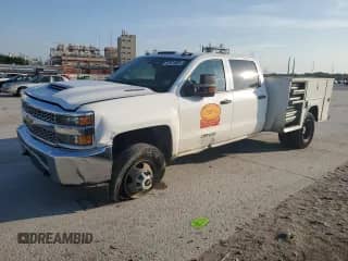 2019 Chevrolet Silverado 1500 with VIN 1GC4CVEY6KF219582, listed as a Copart auction lot 62074065 with 166,602 mi miles and Salvage title. Bid and sale history available at DreamBid. Image 1.