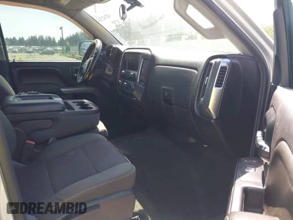 2014 Chevrolet Silverado 1500 LT with VIN 3GCUKREH0EG399090, listed as a IAAI auction lot 42142324 with 104,226 mi miles and . Bid and sale history available at DreamBid. Image 5.