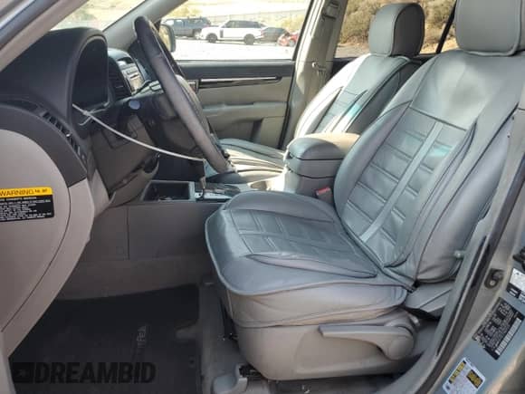 2007 Hyundai Santa Fe SE with VIN 5NMSH73E77H021570, listed as a Copart auction lot 71045165 with 196,448 mi miles and Salvage title. Bid and sale history available at DreamBid. Image 7.