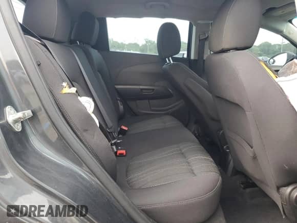 2012 Chevrolet Sonic LT z VIN 1G1JD6SH8C4225657, wystawiony jako Copart lot #63053925 z przebiegiem 139 531 mil mil oraz Szkoda całkowita • Salvage title. Historia ofert i sprzedaży dostępna na DreamBid. Obrazek 10.