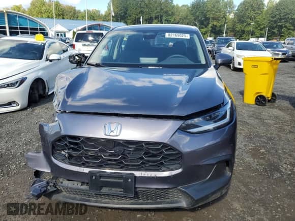 2023 Honda HR-V LX with VIN 3CZRZ2H32PM721882, listed as a Copart auction lot 82169025 with 77,864 mi miles and Clean title. Bid and sale history available at DreamBid. Image 5.