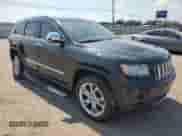 2012 Jeep Grand Cherokee Overland with VIN 1C4RJECG4CC354505, listed as a Copart auction lot 81052135 with 126,523 mi miles and Salvage title. Bid and sale history available at DreamBid. Image 4.