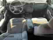 1999 Chevrolet Blazer LS z VIN 1GNCS13W6X2217684, wystawiony jako Copart lot #63035645 z przebiegiem 114 567 mil mil oraz Szkoda całkowita • Salvage title. Historia ofert i sprzedaży dostępna na DreamBid. Obrazek 8.