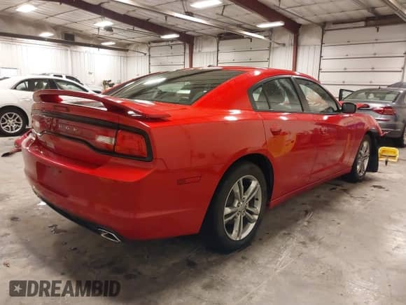2013 Dodge Charger SXT with VIN 2C3CDXJG6DH528802, listed as a IAAI auction lot 42172409 with 77,107 mi miles and . Bid and sale history available at DreamBid. Image 4.
