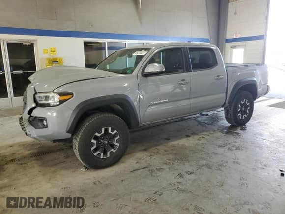 2020 Toyota Tacoma TRD Off Road с VIN 5TFCZ5AN9LX225426, выставлен на аукционе Copart как лот 85274475 с пробегом 55 086 миль миль и Списание • Salvage title. История ставок и продаж доступна на DreamBid. Изображение 1.