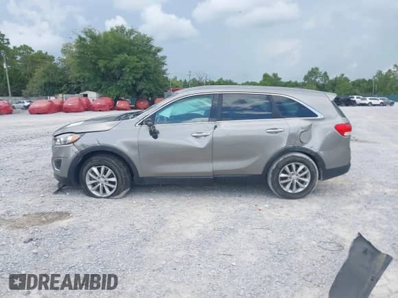 2018 Kia Sorento LX with VIN 5XYPG4A39JG339054, listed as a IAAI auction lot 42476816 with 121,340 mi miles and . Bid and sale history available at DreamBid. Image 15.