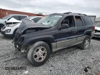 2000 Jeep Grand Cherokee Laredo с VIN 1J4G248S9YC285582, выставлен на аукционе Copart как лот 66305675 с пробегом Не указан миль и Списание • Salvage title. История ставок и продаж доступна на DreamBid. Изображение 1.