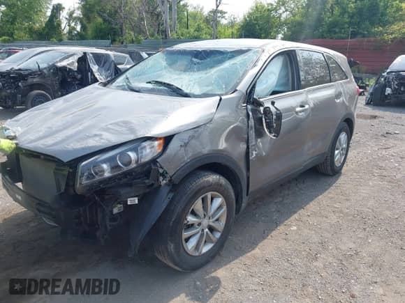 2018 Kia Sorento LX with VIN 5XYPG4A3XJG430706, listed as a IAAI auction lot 42412261 with 64,415 mi miles and . Bid and sale history available at DreamBid. Image 2.