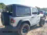 2023 Jeep Wrangler Sport with VIN 1C4HJXAGXPW674068, listed as a IAAI auction lot 42543846 with 15,722 mi miles and . Bid and sale history available at DreamBid. Image 4.