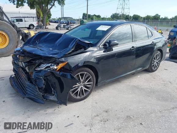 2021 Toyota Camry Hybrid XLE with VIN 4T1F31AK2MU029260, listed as a IAAI auction lot 42639954 with 59,325 mi miles and . Bid and sale history available at DreamBid. Image 17.