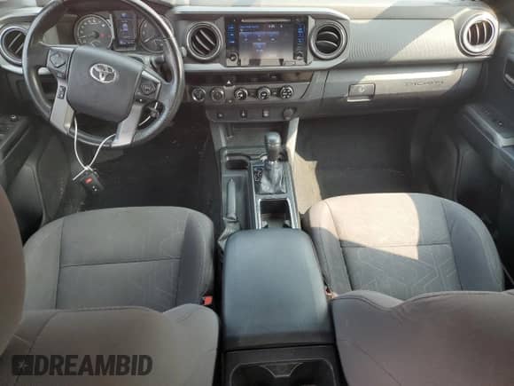 2016 Toyota Tacoma SR5 z VIN 3TMDZ5BNXGM011219, wystawiony jako Copart lot #60076995 z przebiegiem 166 192 mil mil oraz Szkoda całkowita • Salvage title. Historia ofert i sprzedaży dostępna na DreamBid. Obrazek 8.