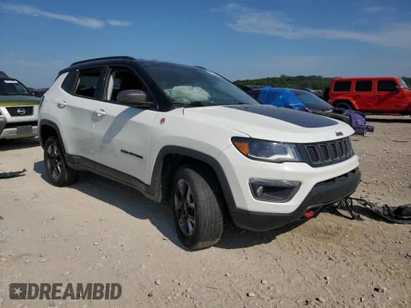 2018 Jeep Compass Trailhawk with VIN 3C4NJDDB6JT184998, listed as a Copart auction lot 67400415 with Not provided miles and Salvage title. Bid and sale history available at DreamBid. Image 4.