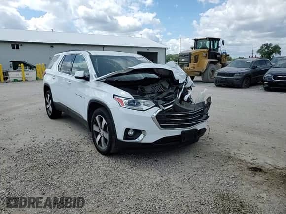 2019 Chevrolet Traverse LT z VIN 1GNEVHKW5KJ251088, wystawiony jako Copart lot #69681405 z przebiegiem Nie podano mil oraz Szkoda całkowita • Salvage title. Historia ofert i sprzedaży dostępna na DreamBid. Obrazek 14.
