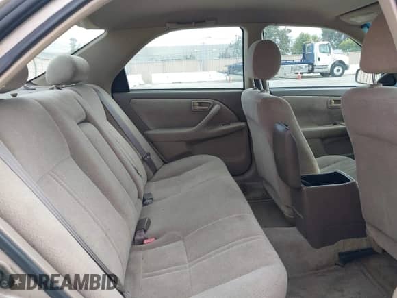 2001 Toyota Camry LE z VIN 4T1BG22K91U083996, wystawiony jako IAAI lot #43422068 z przebiegiem 256 386 mil mil oraz . Historia ofert i sprzedaży dostępna na DreamBid. Obrazek 8.