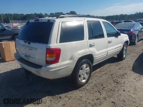 2001 Jeep Grand Cherokee Limited с VIN 1J4GX58S11C571004, выставлен на аукционе IAAI как лот 43261170 с пробегом 205 370 миль миль и . История ставок и продаж доступна на DreamBid. Изображение 4.