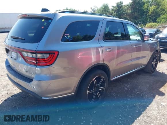 2016 Dodge Durango Limited with VIN 1C4RDHDG8GC476863, listed as a IAAI auction lot 43147056 with 196,574 mi miles and . Bid and sale history available at DreamBid. Image 4.