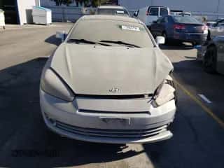 2008 Hyundai Tiburon GS с VIN KMHHM66D38U295664, выставлен на аукционе Copart как лот 73983794 с пробегом 170 134 миль миль и Списание • Salvage title. История ставок и продаж доступна на DreamBid. Изображение 5.
