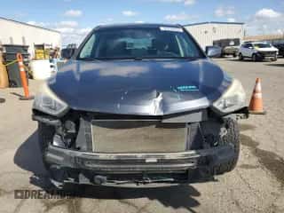 2015 Hyundai Santa Fe z VIN 5XYZTDLB7FG241110, wystawiony jako Copart lot #82229605 z przebiegiem 151 339 mil mil oraz Szkoda całkowita • Salvage title. Historia ofert i sprzedaży dostępna na DreamBid. Obrazek 5.