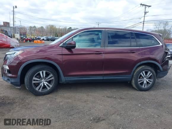 2017 Honda Pilot EX-L with VIN 5FNYF6H74HB040889, listed as a IAAI auction lot 42040094 with 84,001 mi miles and . Bid and sale history available at DreamBid. Image 14.