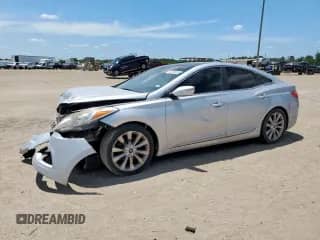 2012 Hyundai Azera с VIN KMHFH4JG7CA181405, выставлен на аукционе Copart как лот 66325695 с пробегом 171 987 миль миль и Списание • Salvage title. История ставок и продаж доступна на DreamBid. Изображение 1.