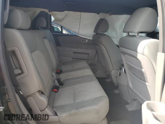 2011 Honda Pilot LX z VIN 5FNYF3H2XBB015358, wystawiony jako Copart lot #68182175 z przebiegiem Nie podano mil oraz Szkoda całkowita • Salvage title. Historia ofert i sprzedaży dostępna na DreamBid. Obrazek 10.