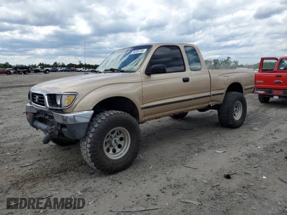 1997 Toyota Tacoma z VIN 4TAWM72N1VZ279828, wystawiony jako Copart lot #58385785 z przebiegiem 347 448 mil mil oraz Szkoda całkowita • Salvage title. Historia ofert i sprzedaży dostępna na DreamBid. Obrazek 1.