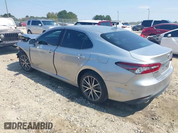 2023 Toyota Camry Hybrid XLE with VIN 4T1F31AK2PU612612, listed as a IAAI auction lot 43246178 with 25,221 mi miles and . Bid and sale history available at DreamBid. Image 3.
