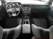 2014 Dodge Challenger SXT с VIN 2C3CDYAG6EH188588, выставлен на аукционе Copart как лот 82005965 с пробегом 102 435 миль миль и Списание • Salvage title. История ставок и продаж доступна на DreamBid. Изображение 8.