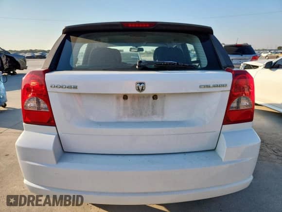 2011 Dodge Caliber Mainstreet z VIN 1B3CB3HA6BD254136, wystawiony jako Copart lot #82222795 z przebiegiem 101 121 mil mil oraz Czysty tytuł • Clean title. Historia ofert i sprzedaży dostępna na DreamBid. Obrazek 6.