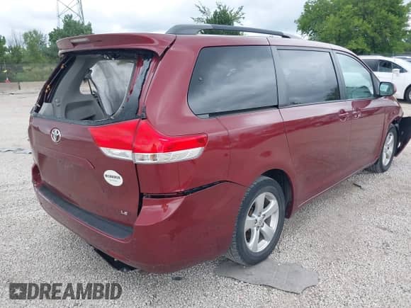 2014 Toyota Sienna LE AAS with VIN 5TDKK3DC7ES435563, listed as a IAAI auction lot 43014633 with 201,161 mi miles and . Bid and sale history available at DreamBid. Image 4.