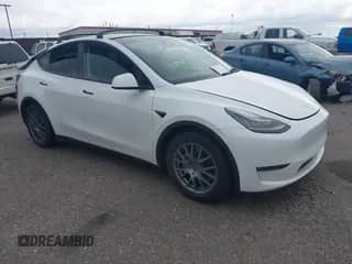 2021 Tesla Model Y Long Range with VIN 5YJYGAEE9MF183382, listed as a IAAI auction lot 42790605 with 74,445 mi miles and . Bid and sale history available at DreamBid. Image 1.