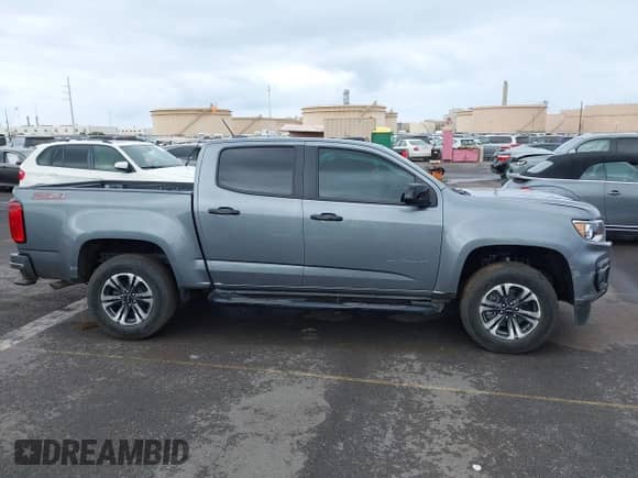 2022 Chevrolet Colorado 2WD Z71 z VIN 1GCGSDENXN1173627, wystawiony jako IAAI lot #42406970 z przebiegiem 21 937 mil mil oraz . Historia ofert i sprzedaży dostępna na DreamBid. Obrazek 12.