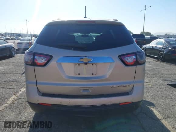 2014 Chevrolet Traverse LT z VIN 1GNKRHKD3EJ109929, wystawiony jako IAAI lot #42515411 z przebiegiem Nie podano mil oraz . Historia ofert i sprzedaży dostępna na DreamBid. Obrazek 16.