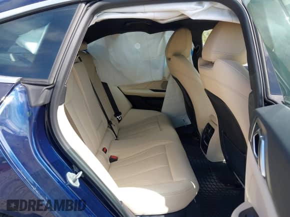 2024 BMW i4 xDrive40 with VIN WBY83FB06RFS78758, listed as a IAAI auction lot 42205579 with 6,297 mi miles and . Bid and sale history available at DreamBid. Image 8.