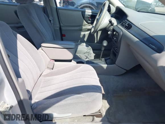 2005 Chevrolet Malibu Classic z VIN 1G1ND52F05M157948, wystawiony jako IAAI lot #42802810 z przebiegiem 61 473 mil mil oraz . Historia ofert i sprzedaży dostępna na DreamBid. Obrazek 5.