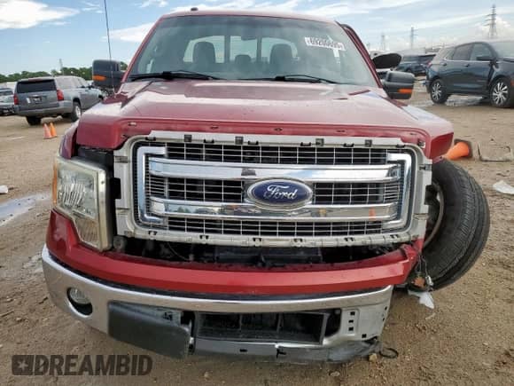2014 Ford F-150 XL with VIN 1FTFW1CT7EFA11795, listed as a Copart auction lot 69200695 with 153,744 mi miles and Salvage title. Bid and sale history available at DreamBid. Image 5.