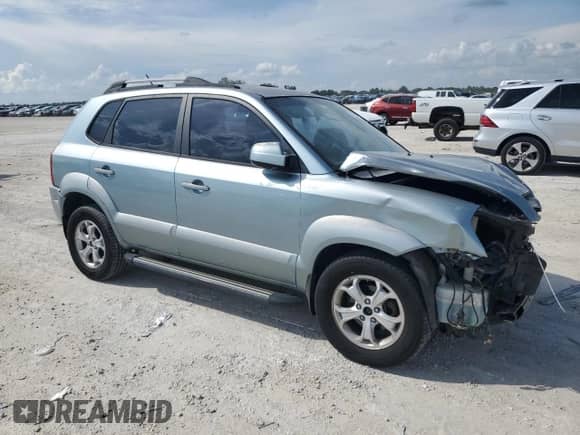 2009 Hyundai Tucson with VIN KM8JN12B59U971278, listed as a Copart auction lot 71657114 with 230,390 mi miles and Salvage title. Bid and sale history available at DreamBid. Image 4.