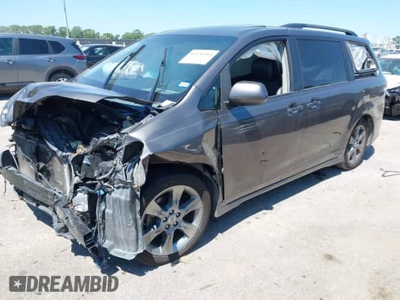 2012 Toyota Sienna SE with VIN 5TDXK3DC5CS232979, listed as a IAAI auction lot 43136504 with 198,231 mi miles and . Bid and sale history available at DreamBid. Image 2.