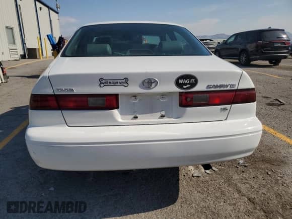 1998 Toyota Camry LE with VIN JT2BF28K3W0130302, listed as a Copart auction lot 68680385 with Not provided miles and Salvage title. Bid and sale history available at DreamBid. Image 6.