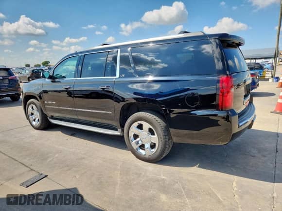 2016 Chevrolet Suburban LTZ with VIN 1GNSCJKCXGR254650, listed as a Copart auction lot 81579105 with 125,827 mi miles and Salvage title. Bid and sale history available at DreamBid. Image 2.