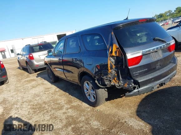 2013 Dodge Durango SXT with VIN 1C4RDJAG1DC695624, listed as a IAAI auction lot 43134491 with 219,799 mi miles and . Bid and sale history available at DreamBid. Image 3.