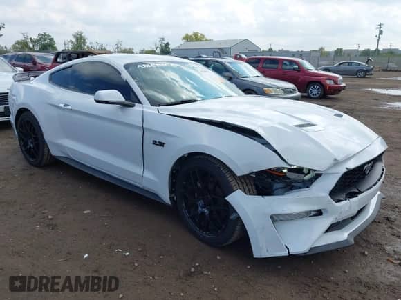 2020 Ford Mustang EcoBoost z VIN 1FA6P8TH8L5138923, wystawiony jako IAAI lot #43289295 z przebiegiem 69 708 mil mil oraz . Historia ofert i sprzedaży dostępna na DreamBid. Obrazek 1.
