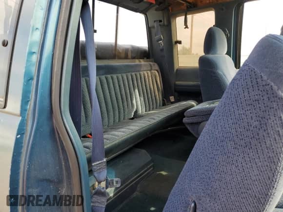1991 GMC Sierra 1500 SLT z VIN 2GTEK19Z4M1542137, wystawiony jako Copart lot #68024074 z przebiegiem 347 281 mil mil oraz Szkoda całkowita • Salvage title. Historia ofert i sprzedaży dostępna na DreamBid. Obrazek 10.