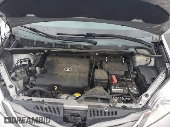 2014 Toyota Sienna XLE with VIN 5TDYK3DC7ES474017, listed as a Copart auction lot 81595945 with 185,704 mi miles and Salvage title. Bid and sale history available at DreamBid. Image 12.