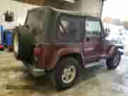 2001 Jeep Wrangler Sahara z VIN 1J4FA59S11P334534, wystawiony jako Copart lot #90651005 z przebiegiem 155 822 mil mil oraz Czysty tytuł • Clean title. Historia ofert i sprzedaży dostępna na DreamBid. Obrazek 3.