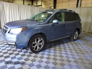 2017 Subaru Forester Touring with VIN JF2SJATC1HH557290, listed as a Copart auction lot 81665585 with 111,769 mi miles and Clean title. Bid and sale history available at DreamBid. Image 1.