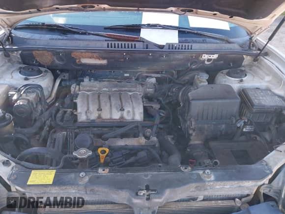 2003 Hyundai Santa Fe GLS z VIN KM8SC13E93U541750, wystawiony jako IAAI lot #42200817 z przebiegiem 174 842 mil mil oraz . Historia ofert i sprzedaży dostępna na DreamBid. Obrazek 10.